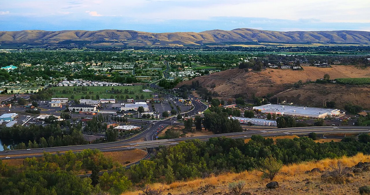 Yakima Valley farmland and commercial buildings from a hillside overlook