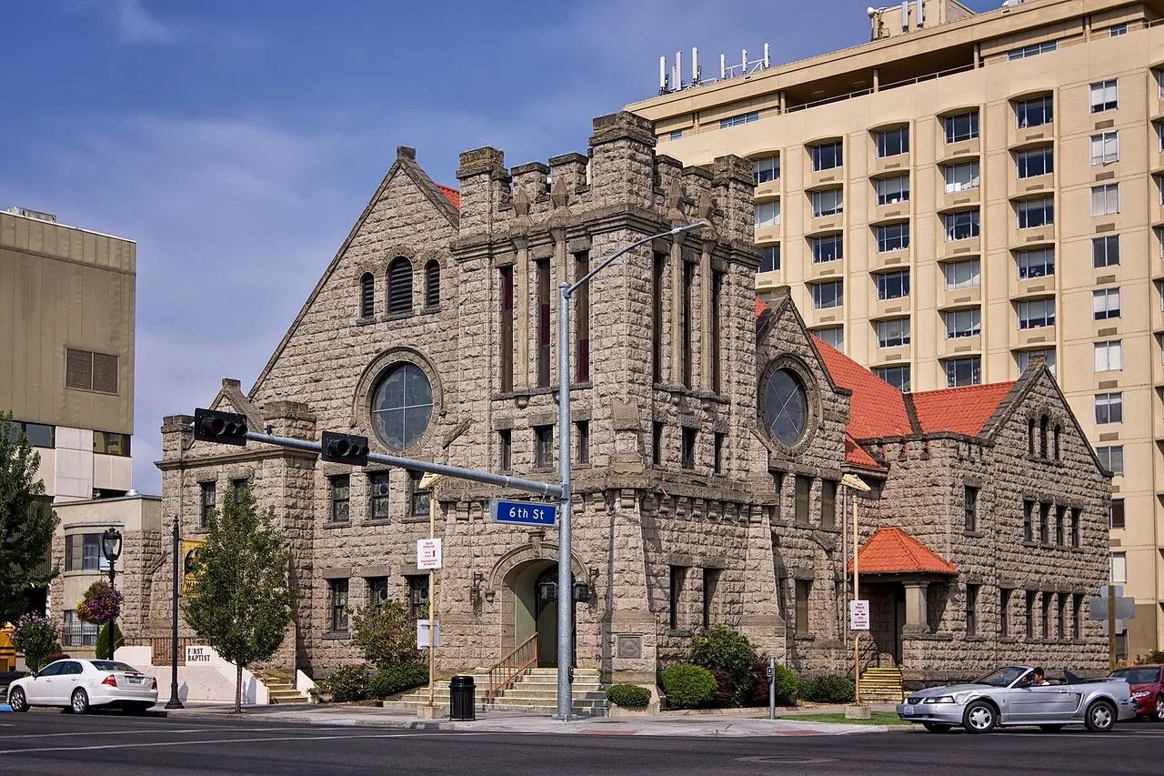 Historic stone church and downtown buildings in Yakima, Washington